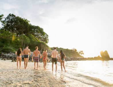 Group of happy friends on a tropical island